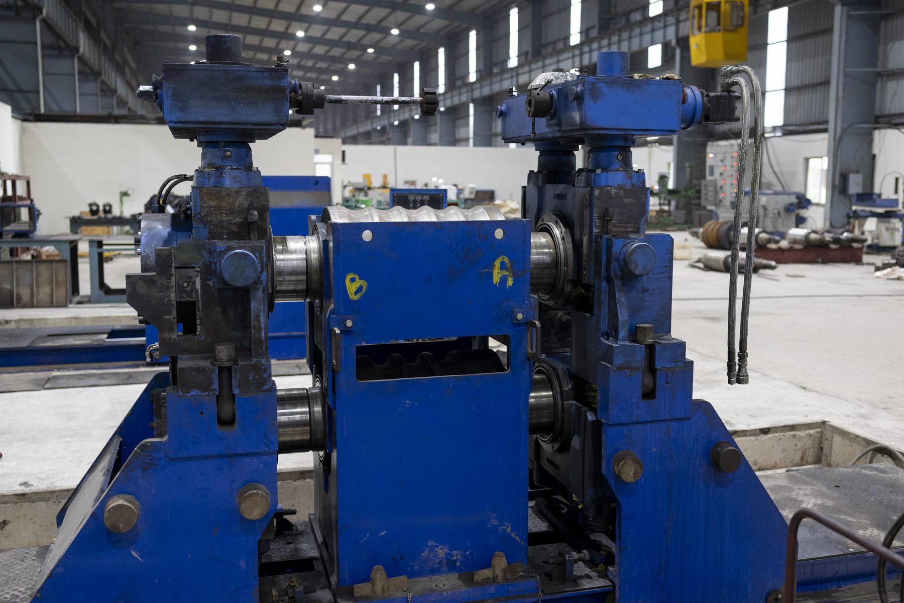 A blue roll stand in the lighter end of the bay